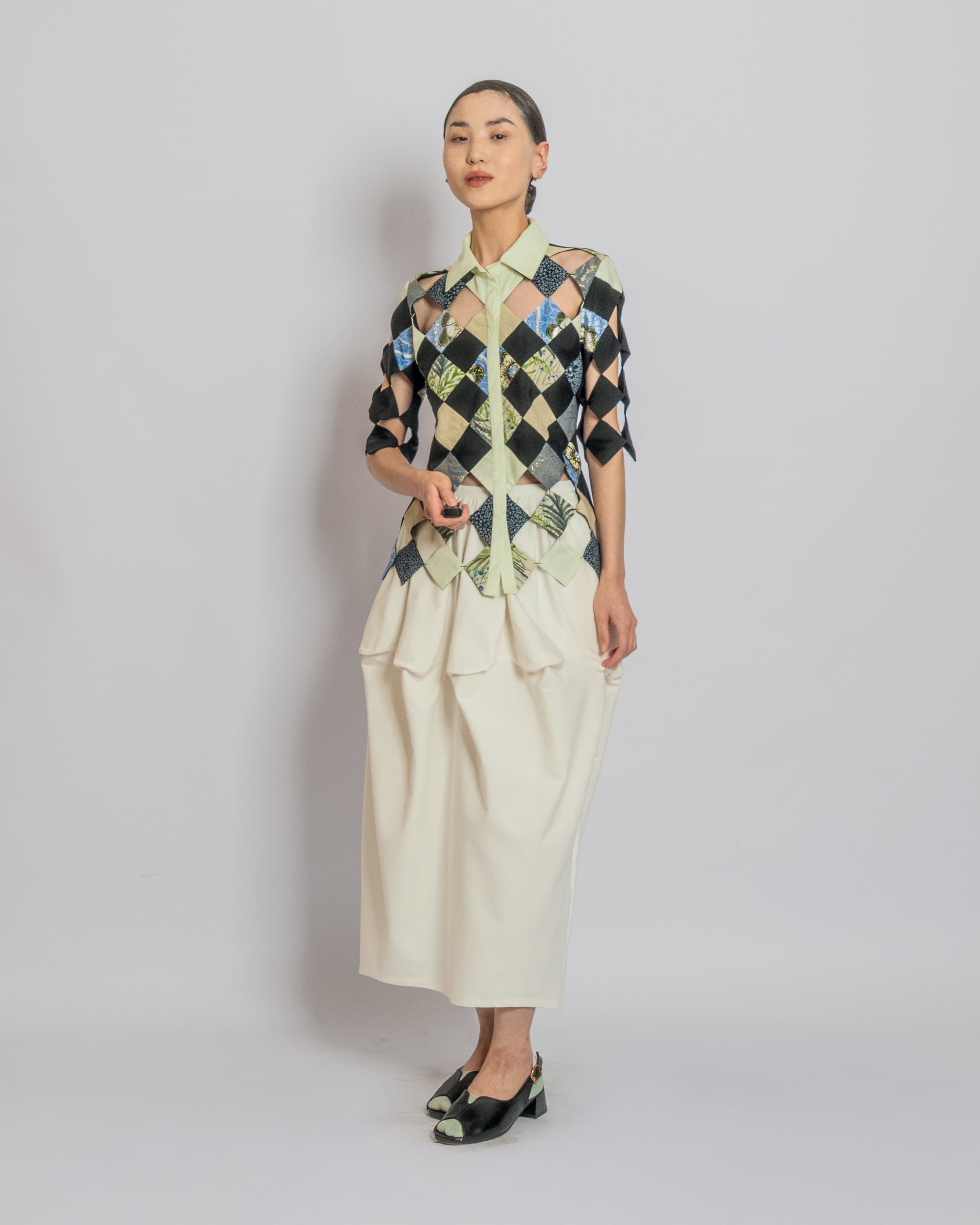 J.KIM FW 2026 көрсетіліміндегі модельдер мен музалардың автопортреттері