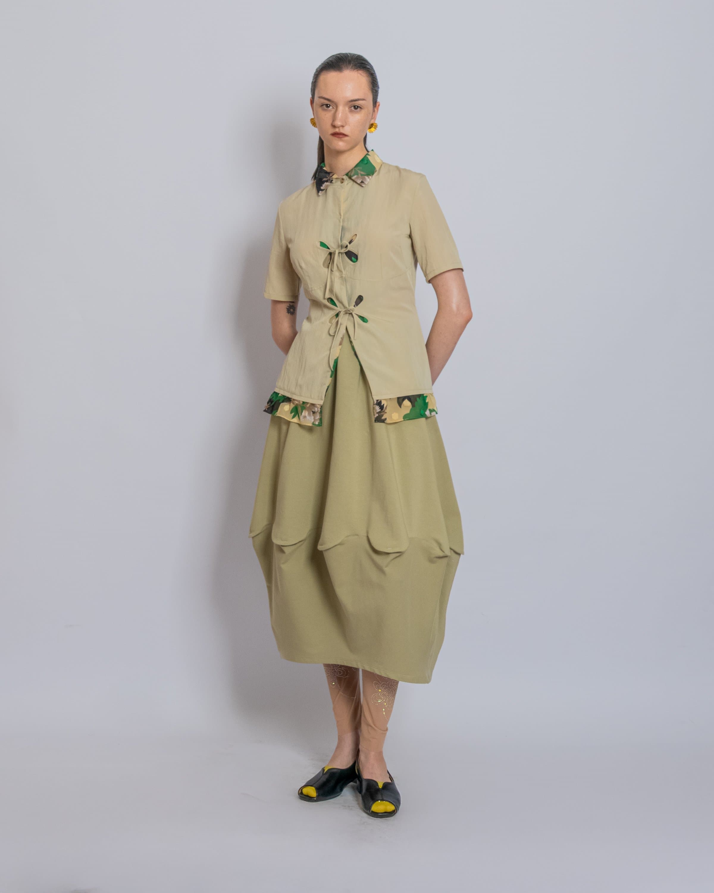 J.KIM көктем-жаз 2026 көрсетілімінің сахна сыртынан көрініс