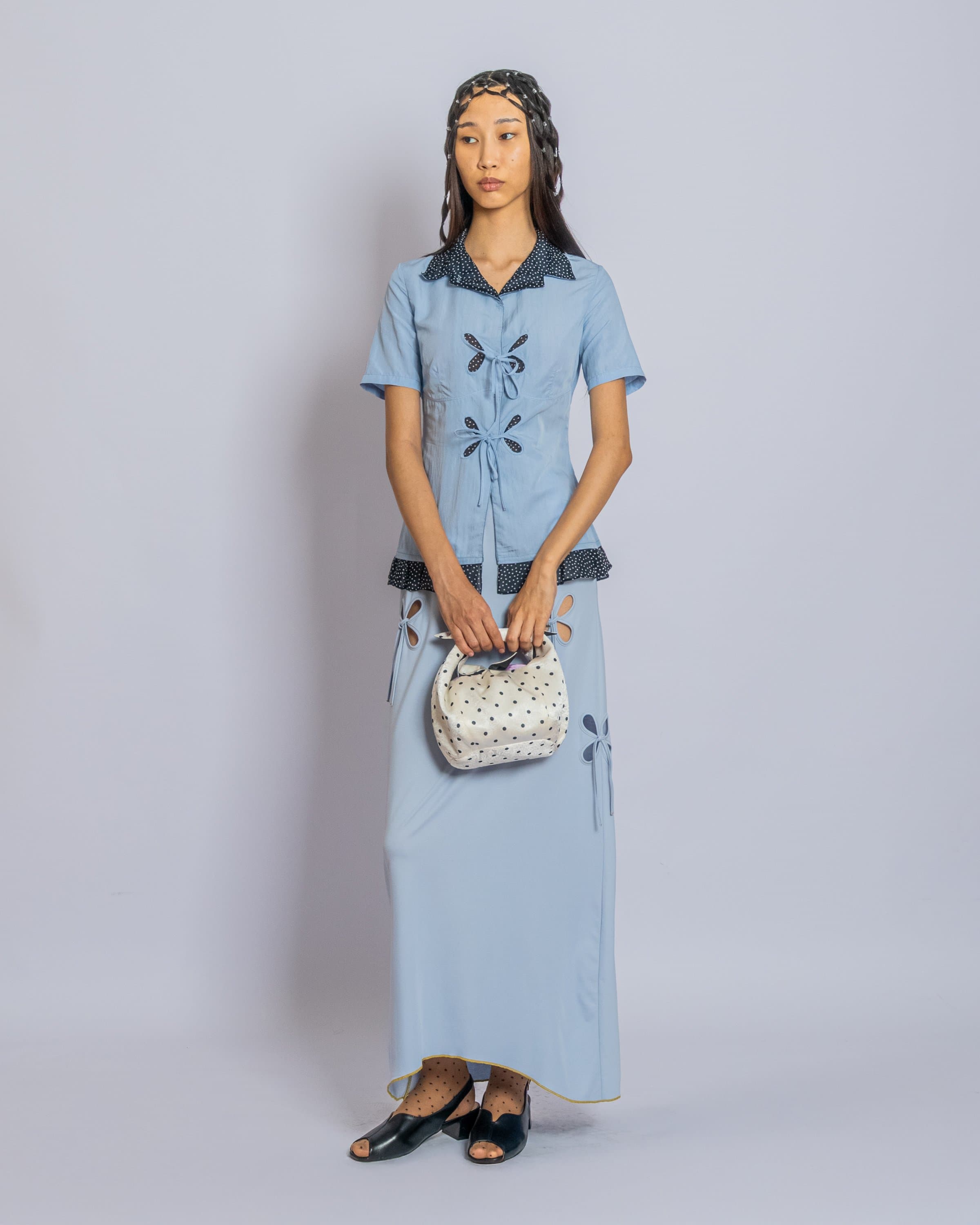 J.KIM көктем-жаз 2026 көрсетілімінің сахна сыртынан көрініс