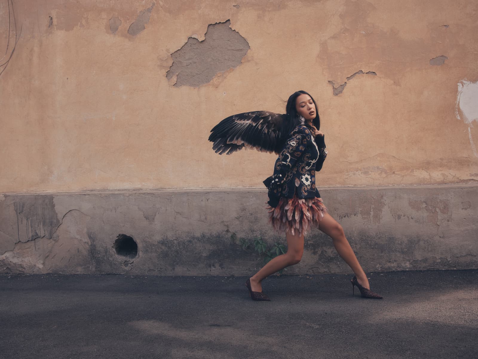 Платье Akhmadullina
Крылья IIya Migmoon 
Свитер Sacai (Saks Fifth Avenue Almaty)
Туфли Gadebe (Saks Fifth Avenue Almaty)