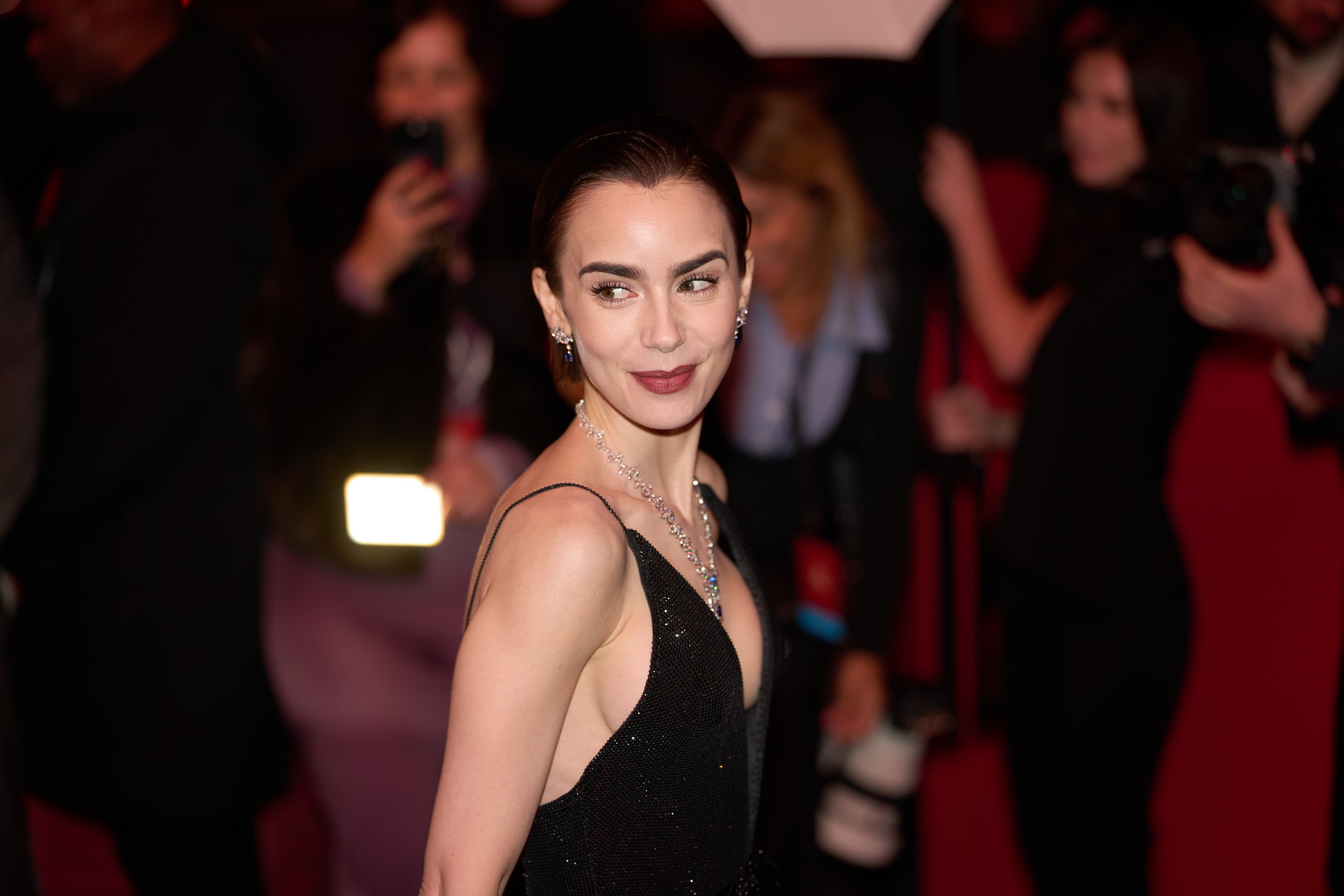 Лили Коллинз | Фото: Эдвард Бертло | Getty Images